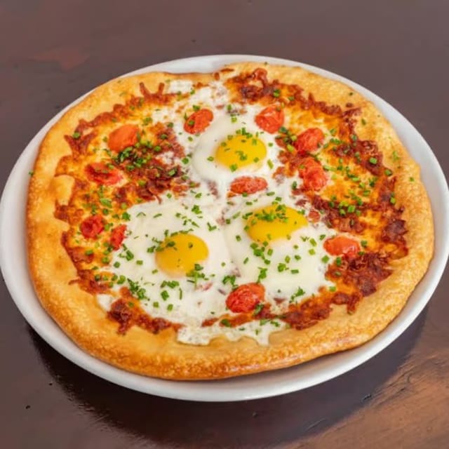 Bacon, Egg, & Tomato Tango Pizza.